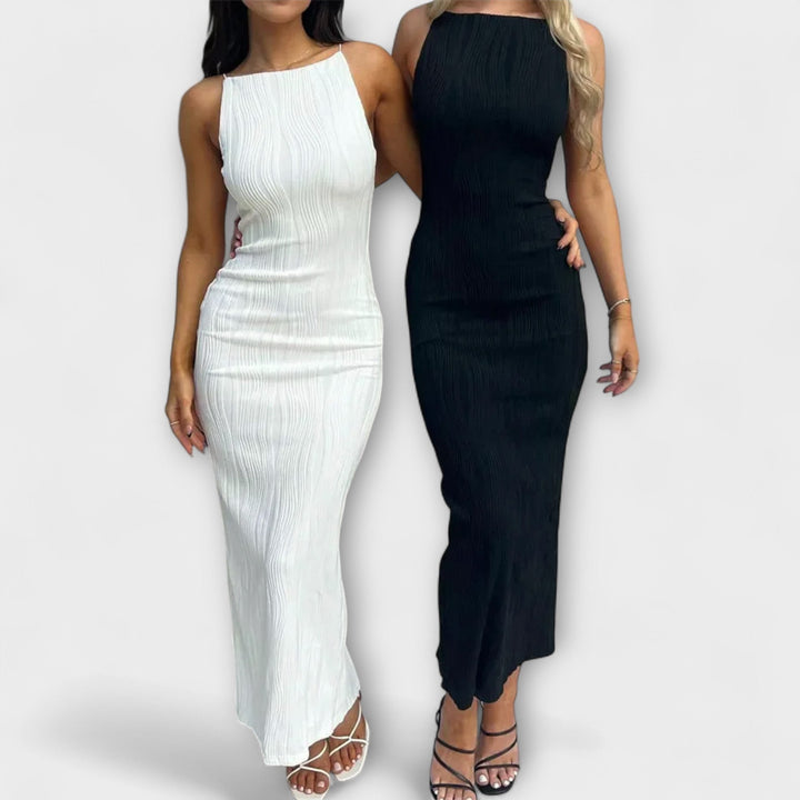 Elegantní bezrukávový maxi šaty s řasením